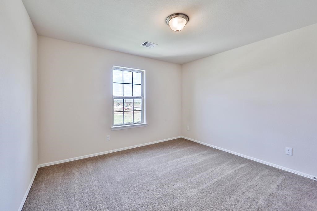 247 Sintra Lk Way Rosenberg, TX 77469 - Photo 25 of 28 an empty room with a window
