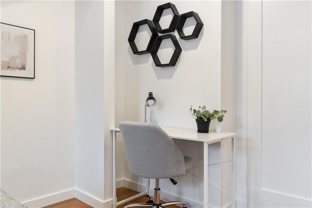 1238 Butterfield Way Pittsburgh, PA 15212 - Photo 18 of 25 a table with potted plant and a dresser
