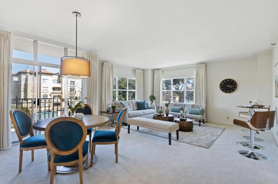 1 Baldwin Avenue, Unit 203 San Mateo, CA 94401 - Photo 1 of 13 a living room with furniture and a floor to ceiling window