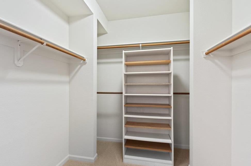 1 Baldwin Avenue, Unit 203 San Mateo, CA 94401 - Photo 12 of 13 a view of walk in closet with empty racks