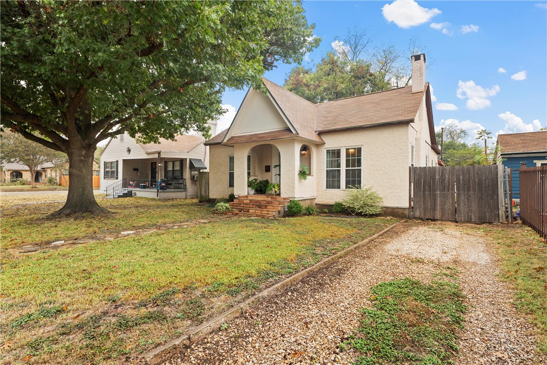2923 Live Oak Avenue Waco, TX 76708 - Photo 2 of 22 a view of a yard in front of house