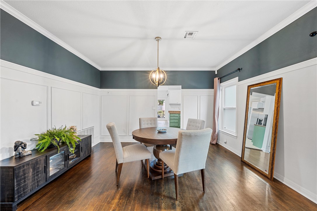 2923 Live Oak Avenue Waco, TX 76708 - Photo 5 of 22 a dining room with furniture potted plants and wooden floor