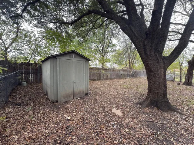 a view of outdoor space with deck and tree