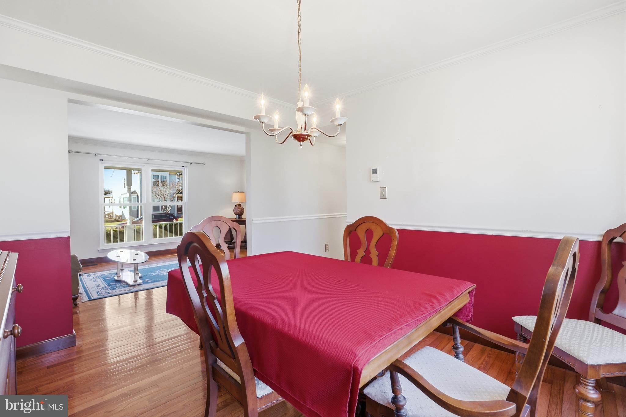 9709 Noble Ridge Terrace Gaithersburg, MD 20882 - Photo 13 of 64 a view of a dining room with furniture