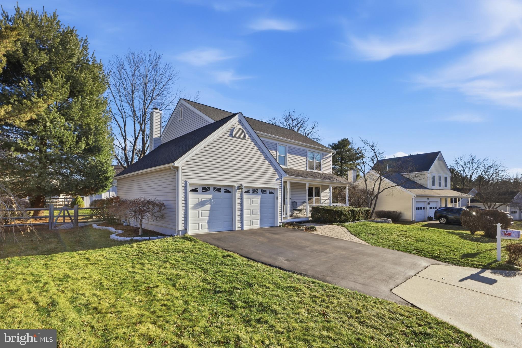 9709 Noble Ridge Terrace Gaithersburg, MD 20882 - Photo 3 of 64 a view of a house with a yard