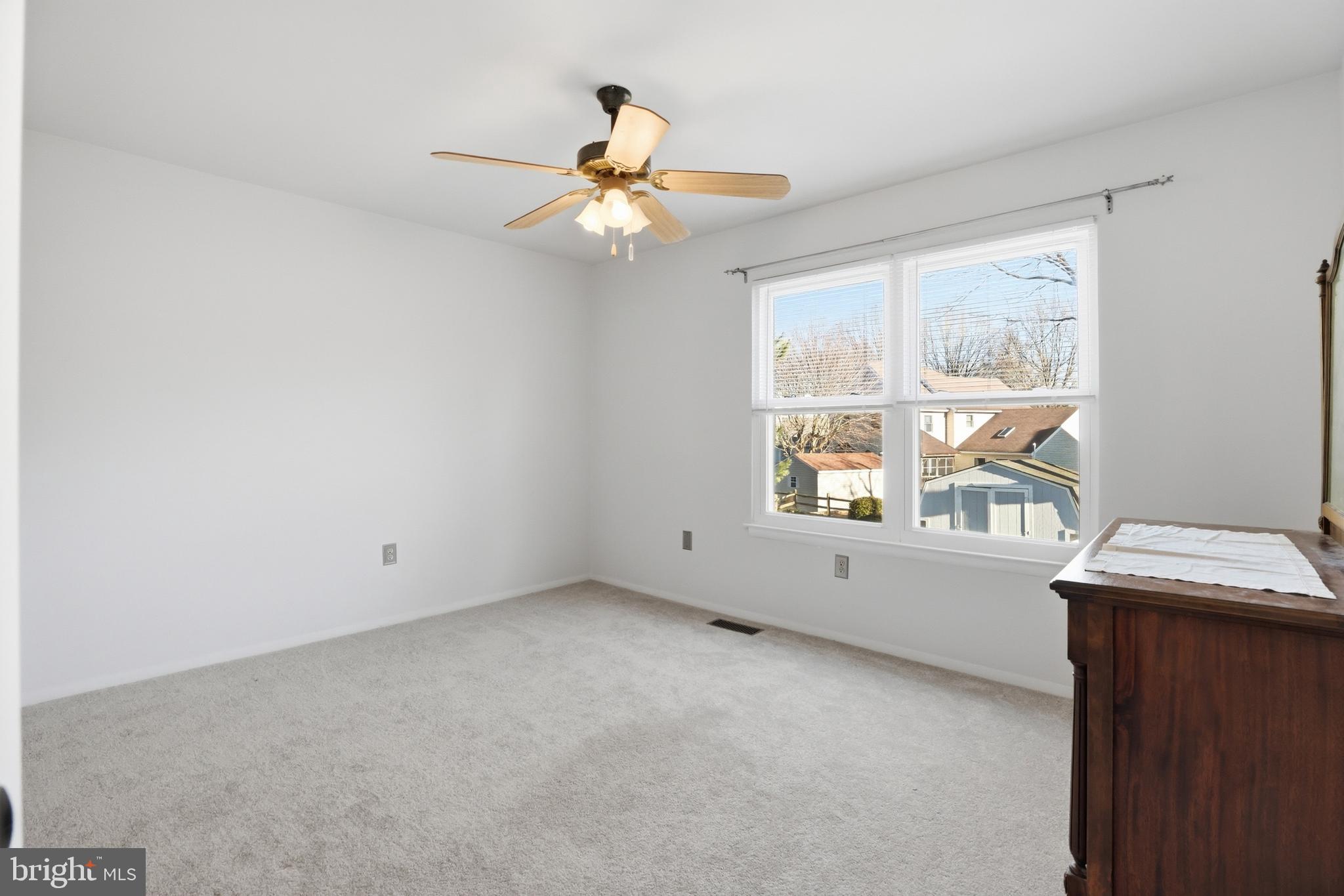 9709 Noble Ridge Terrace Gaithersburg, MD 20882 - Photo 31 of 64 a view of an empty room with a window