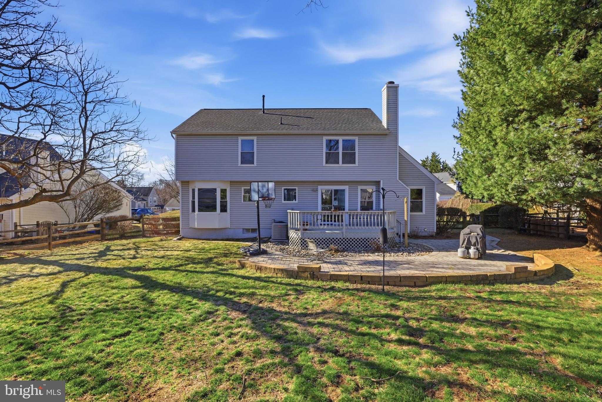 9709 Noble Ridge Terrace Gaithersburg, MD 20882 - Photo 48 of 64 a front view of a house with a yard