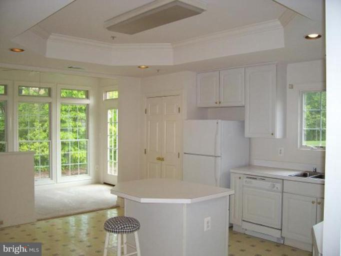 335 Colony Point Place Edgewater, MD 21037 - Photo 2 of 7 a white bath tub sitting next to a white sink