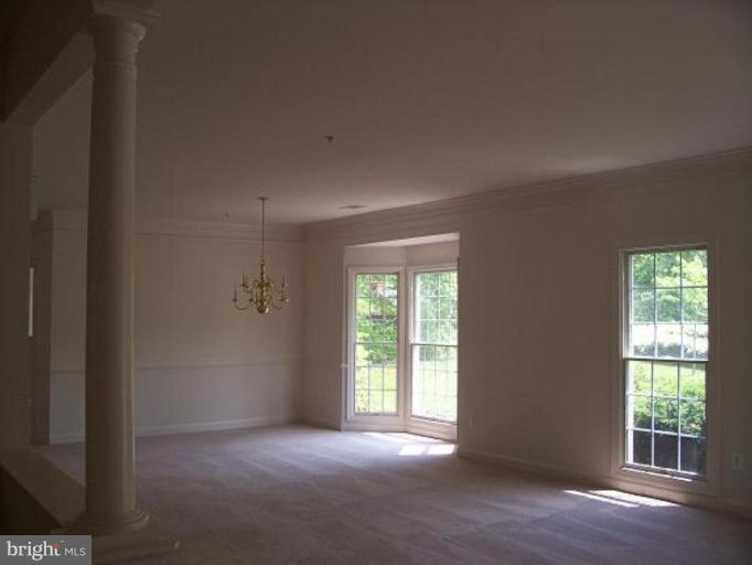 335 Colony Point Place Edgewater, MD 21037 - Photo 4 of 7 a view of an empty room with a window
