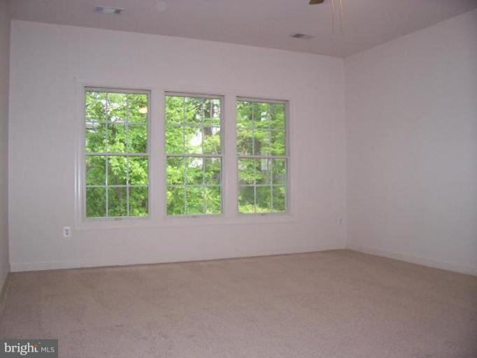 335 Colony Point Place Edgewater, MD 21037 - Photo 5 of 7 an empty room with a window