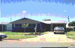 4308 South Bonham Street Amarillo, TX 79110 - Photo 1 of 1 a front view of a house with a yard