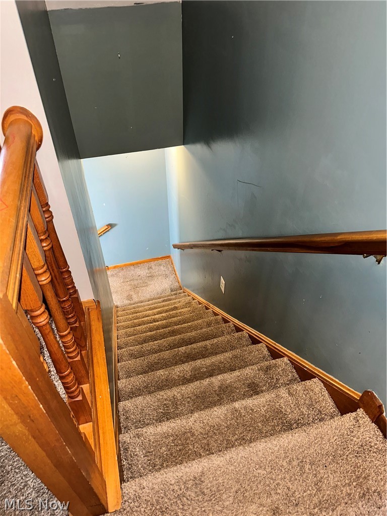 7495 Johnnycake Ridge Road Mentor, OH 44060 - Photo 22 of 50 Stairway featuring carpet