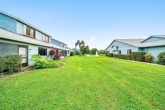 a house view with a garden space