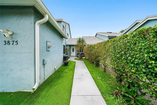 a view of a back yard of the house
