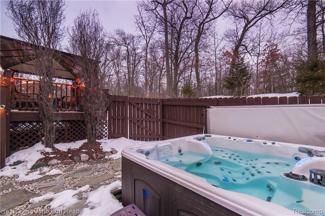 94 Eagle Ridge Road Lake Orion, MI 48360 - Photo 26 of 31 CLEARWATER 6 PERSON SPA IN PRIVATE ENCLOSURE