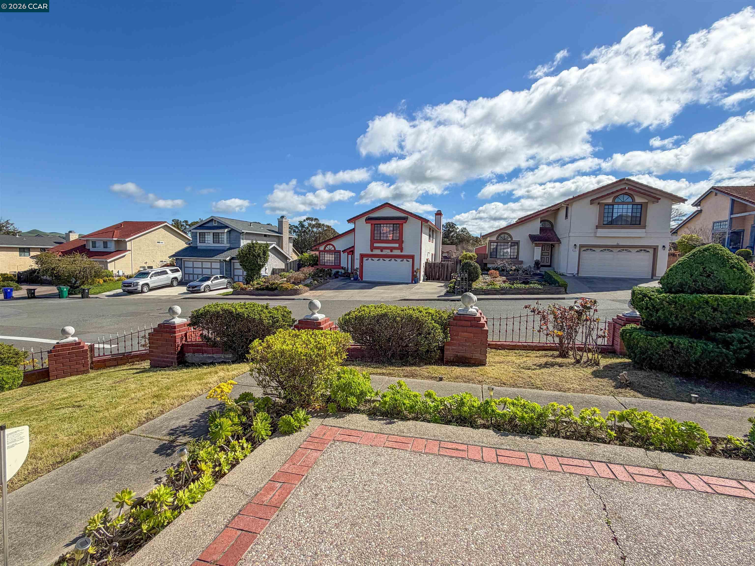 103 Obsidian Way Hercules, CA 94547 - Photo 7 of 7 a front view of a house with garden and porch