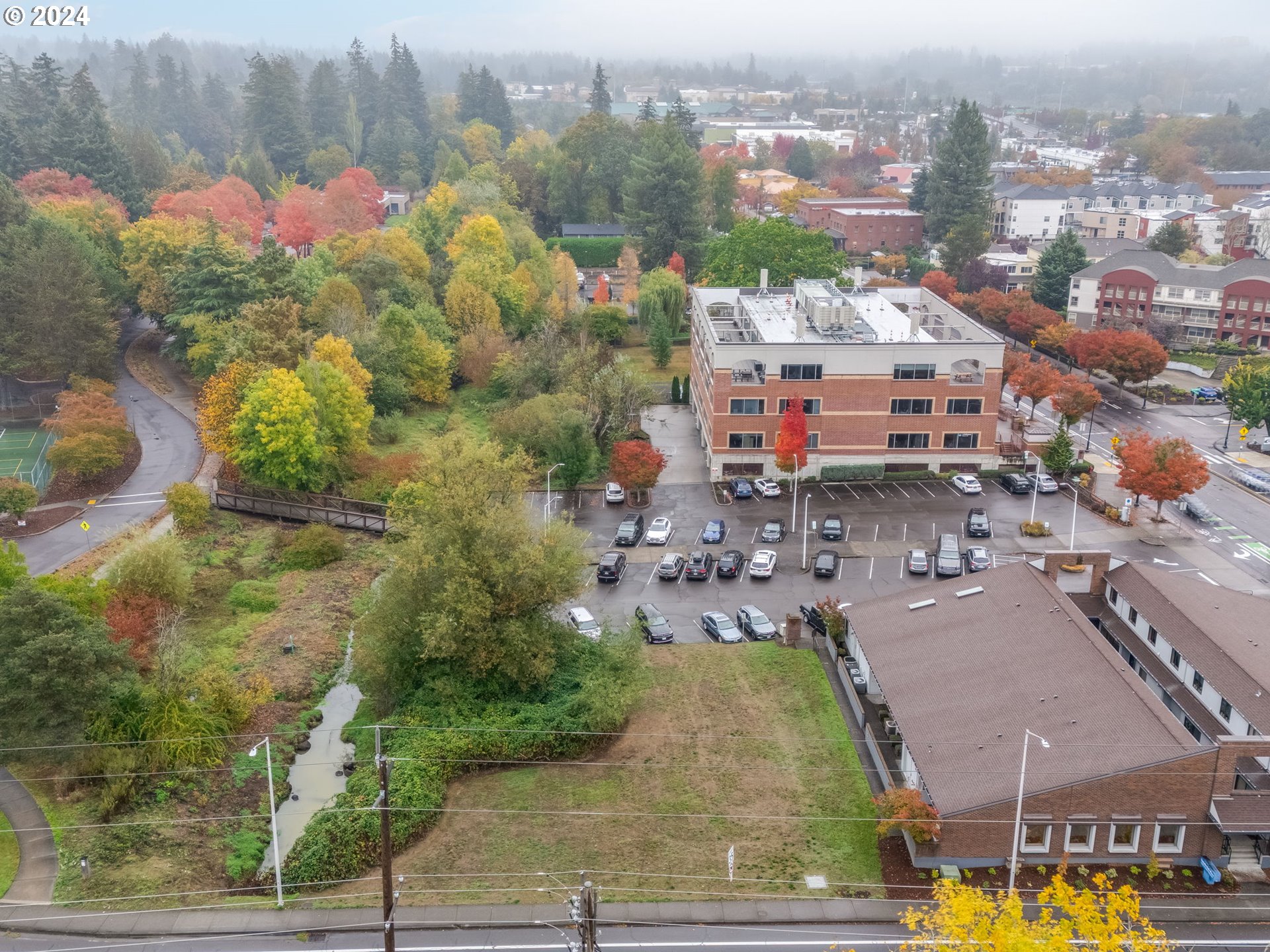 8475 Southwest Tualatin Road Tualatin, OR 97062 - Photo 11 of 23 an aerial view of residential houses with outdoor space