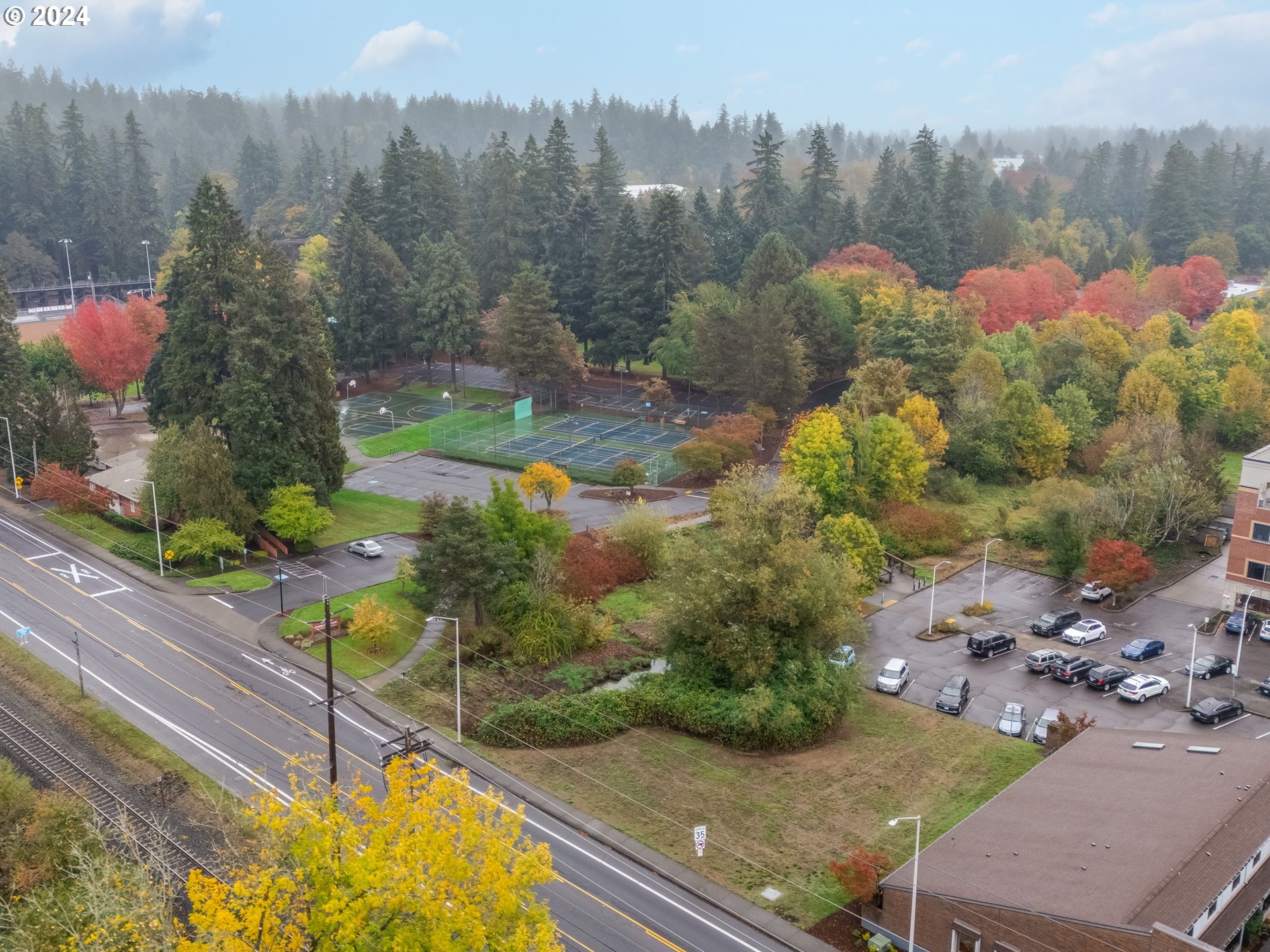 8475 Southwest Tualatin Road Tualatin, OR 97062 - Photo 12 of 23 a view of a city street from a bench