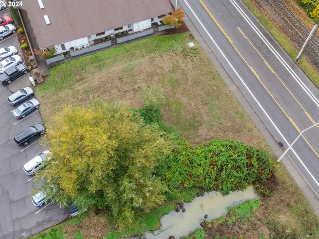 a view of a backyard of the house