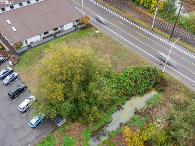 a aerial view of a house with outdoor space
