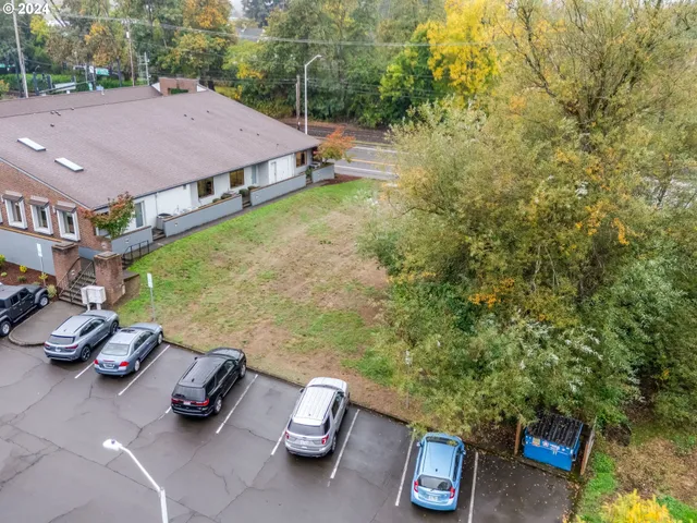 a view of a street with a houses