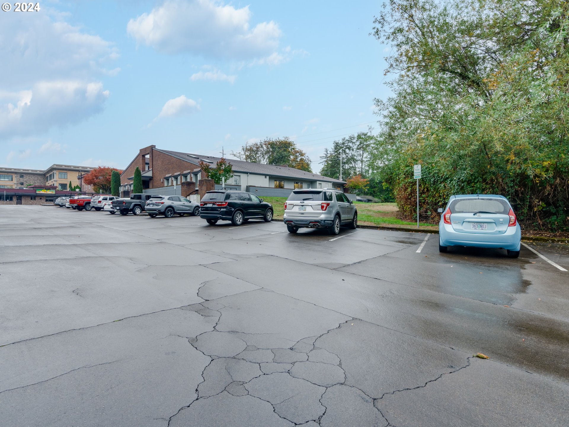 8475 Southwest Tualatin Road Tualatin, OR 97062 - Photo 10 of 23 a view of a cars parked in a parking lot