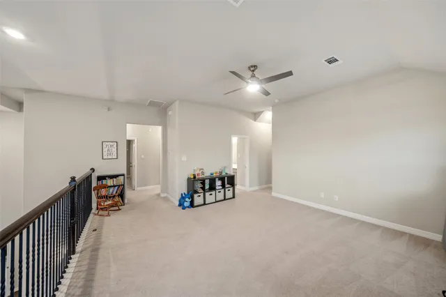 wooden floor in a hall with a window