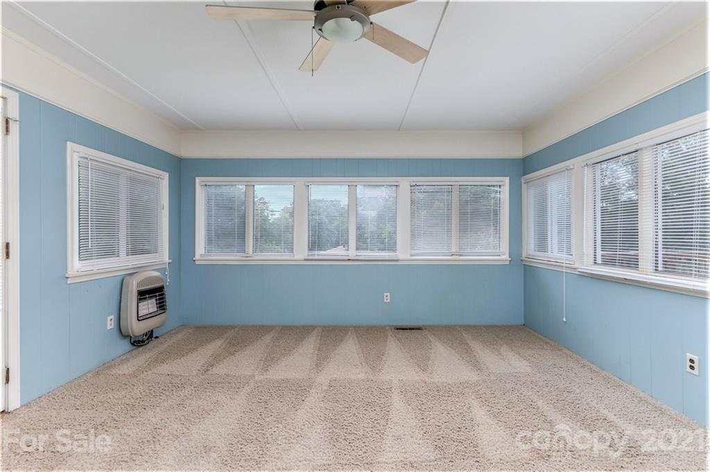306 Kimmswick Road Charlotte, NC 28214 - Photo 12 of 21 a view of an empty room with a window