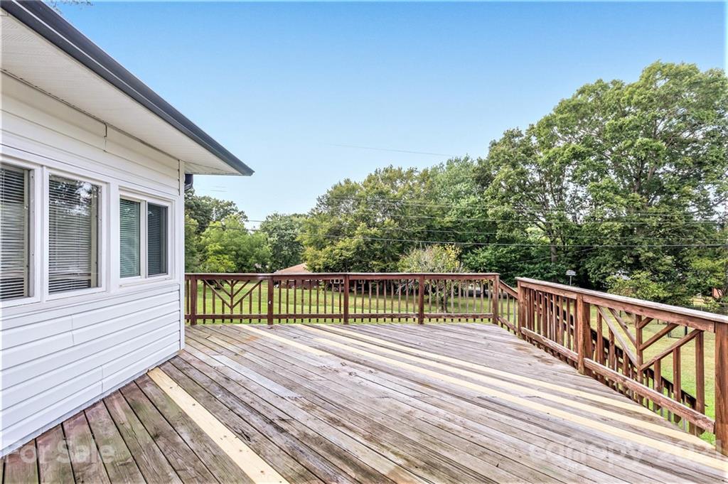 306 Kimmswick Road Charlotte, NC 28214 - Photo 17 of 21 a view of balcony with wooden floor and fence