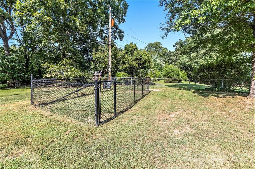 306 Kimmswick Road Charlotte, NC 28214 - Photo 19 of 21 a view of a backyard