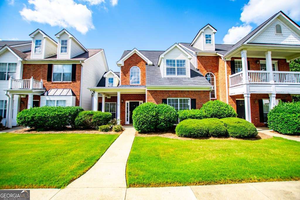255 Morgan Road Carrollton, GA 30116 - Photo 2 of 57 a front view of a house with a yard