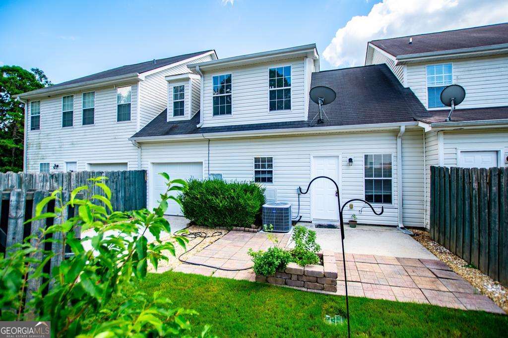 255 Morgan Road Carrollton, GA 30116 - Photo 49 of 57 a front view of a house with garden