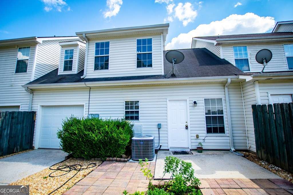 255 Morgan Road Carrollton, GA 30116 - Photo 50 of 57 a front view of a house with garden