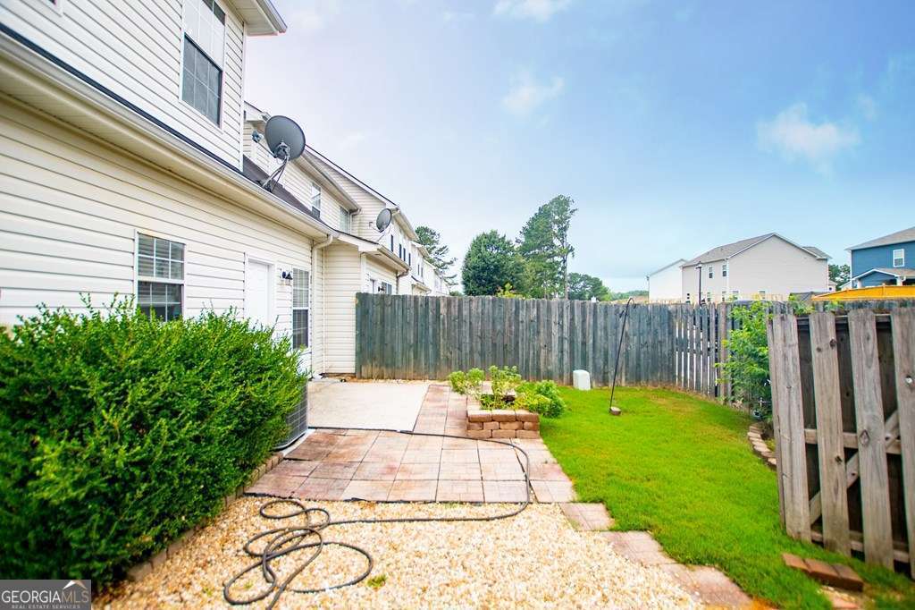 255 Morgan Road Carrollton, GA 30116 - Photo 51 of 57 a garden view with a seating space