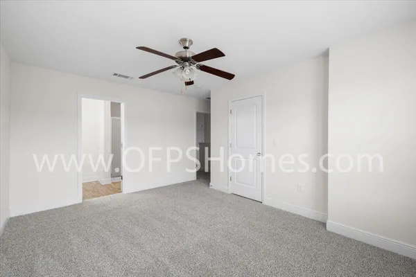 a view of empty room with windows