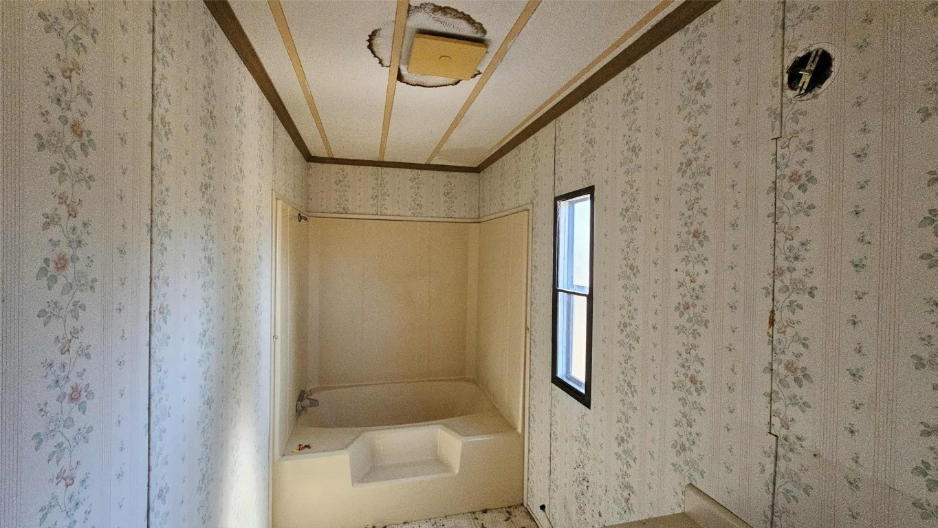 17539 Hodges Road Hilliard, FL 32046 - Photo 38 of 62 a bathroom with a shower