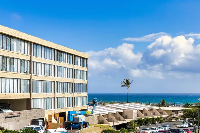 a view of a workspace with furniture