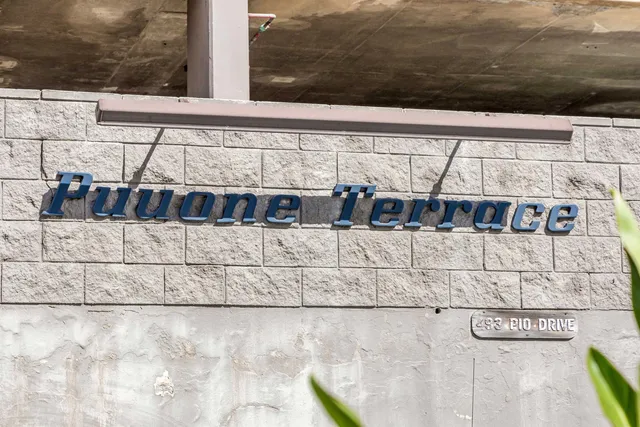 a bathroom with a sink vanity mirror and toilet