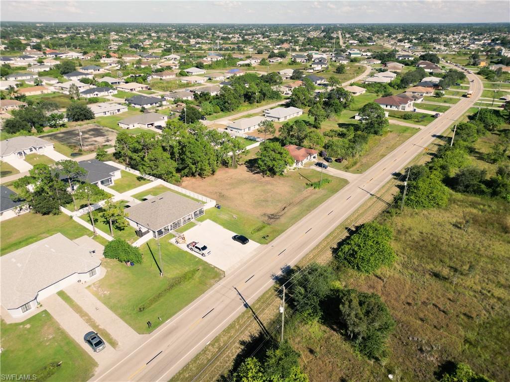 4528 Leonard Boulevard South Lehigh Acres, FL 33973 - Photo 3 of 10 an aerial view of residential houses with outdoor space