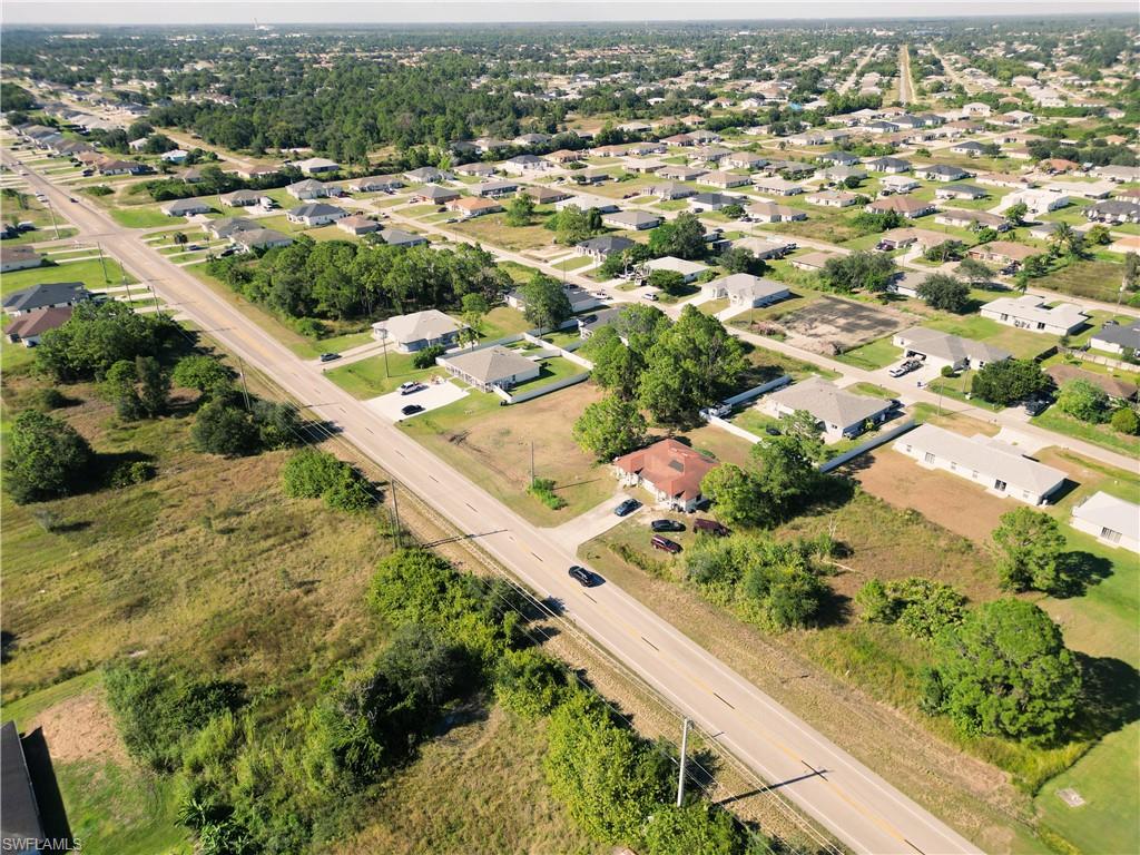 4528 Leonard Boulevard South Lehigh Acres, FL 33973 - Photo 5 of 10 an aerial view of residential houses with outdoor space