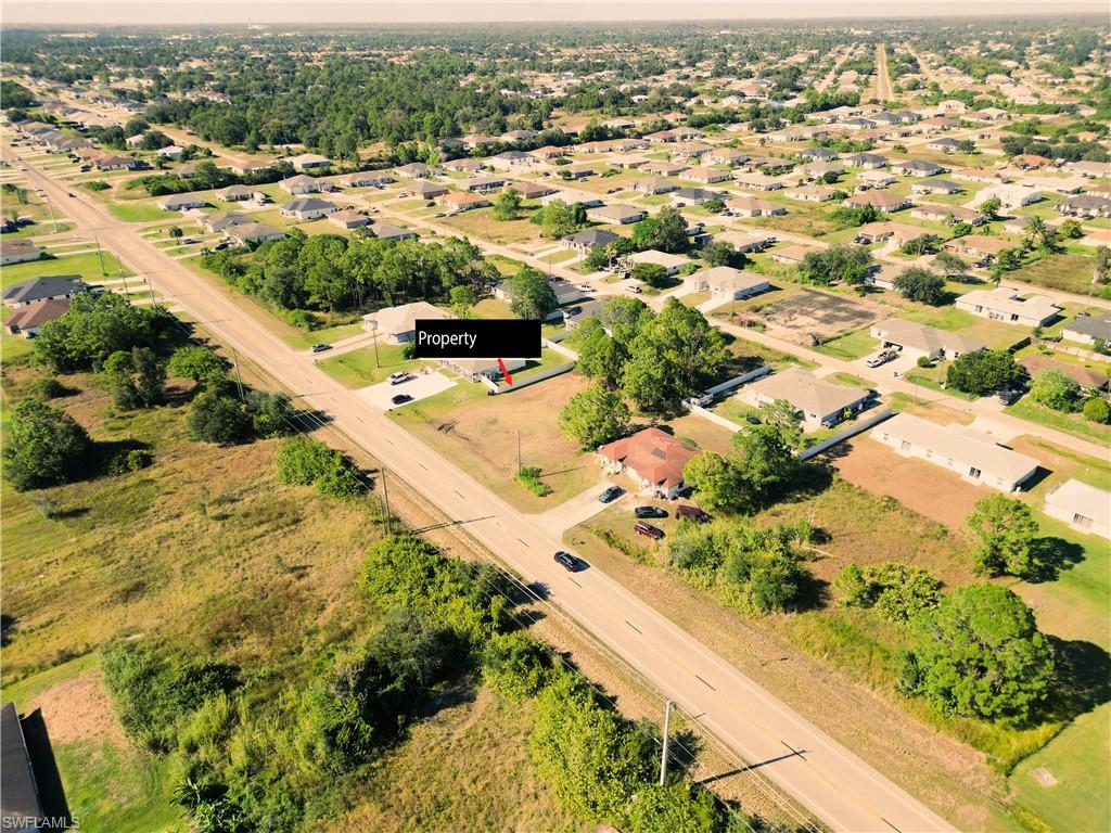 4528 Leonard Boulevard South Lehigh Acres, FL 33973 - Photo 6 of 10 an aerial view of residential houses with outdoor space