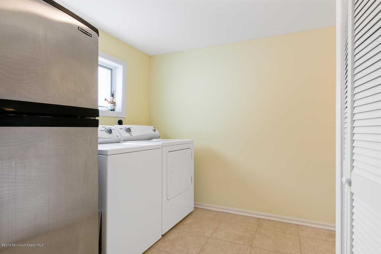 722 Drum Point Road Brick, NJ 08723 - Photo 17 of 28 a utility room with dryer and washer