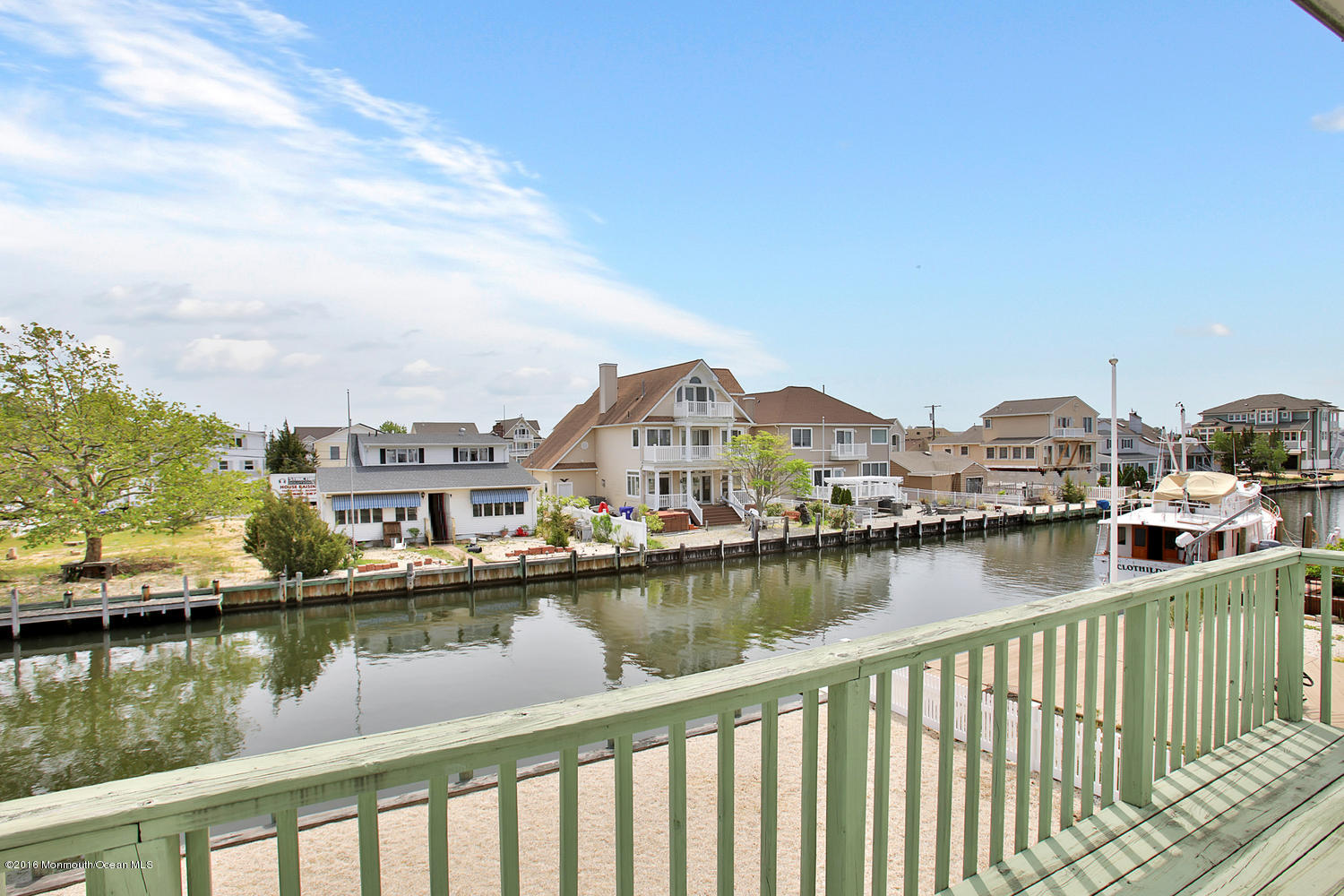 722 Drum Point Road Brick, NJ 08723 - Photo 24 of 28 a view of a lake with city from a lake
