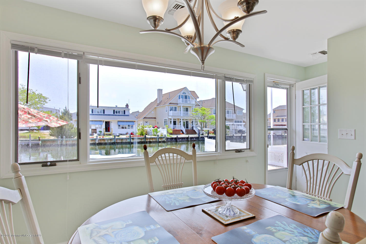 722 Drum Point Road Brick, NJ 08723 - Photo 8 of 28 a bedroom with furniture and a large window