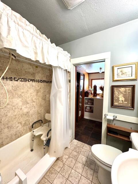 551 East Mound Street Knox, IN 46534 - Photo 12 of 23 a bathroom with a sink a toilet a mirror and shower