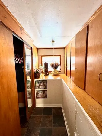 a kitchen with stainless steel appliances a refrigerator and a stove