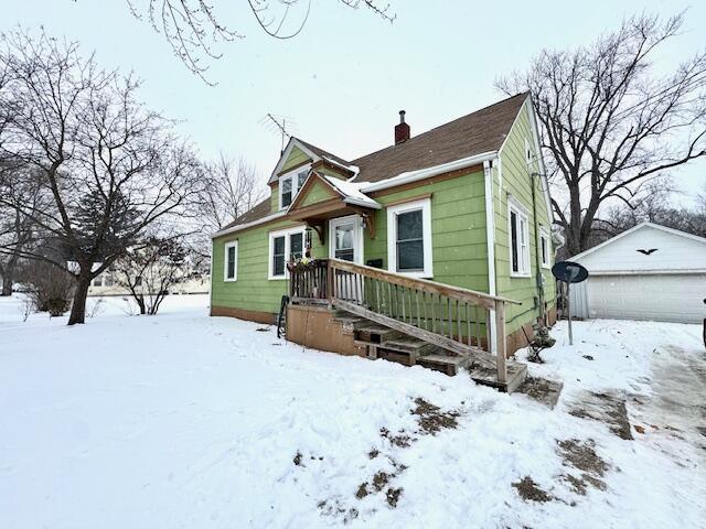 551 East Mound Street Knox, IN 46534 - Photo 19 of 23 a front view of a house with a yard covered in snow
