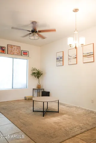 a view of workspace with furniture and natural light