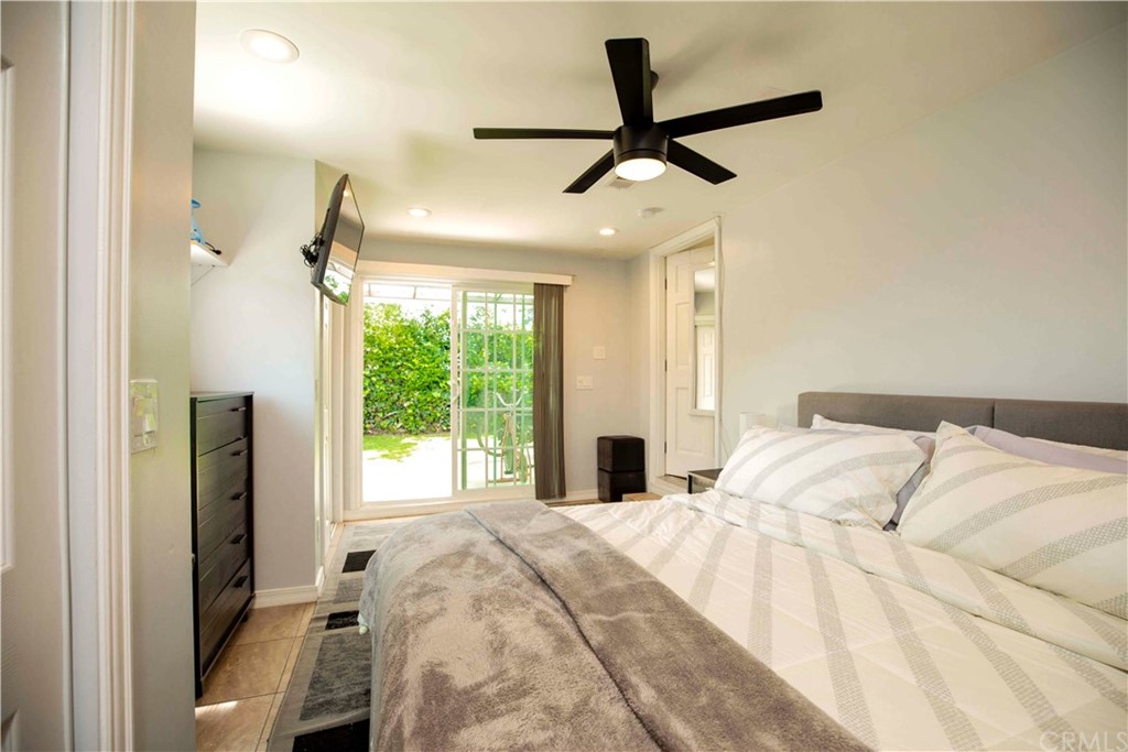 2021 Forest Avenue Pasadena, CA 91103 - Photo 15 of 18 a bed sitting in a bedroom next to a window