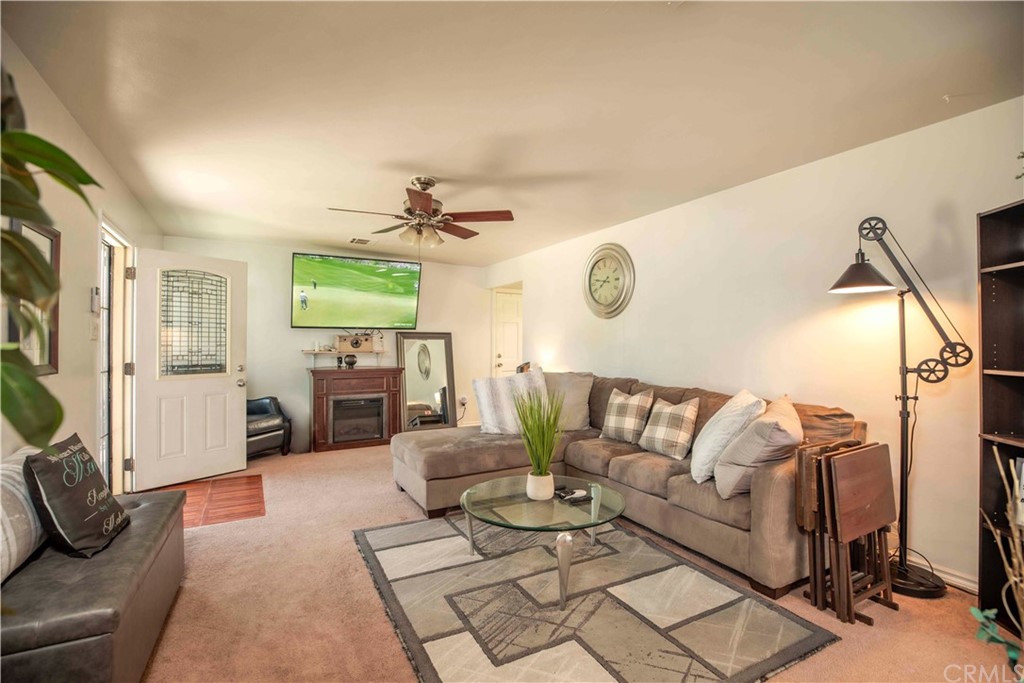 2021 Forest Avenue Pasadena, CA 91103 - Photo 5 of 18 a living room with furniture and a wooden floor